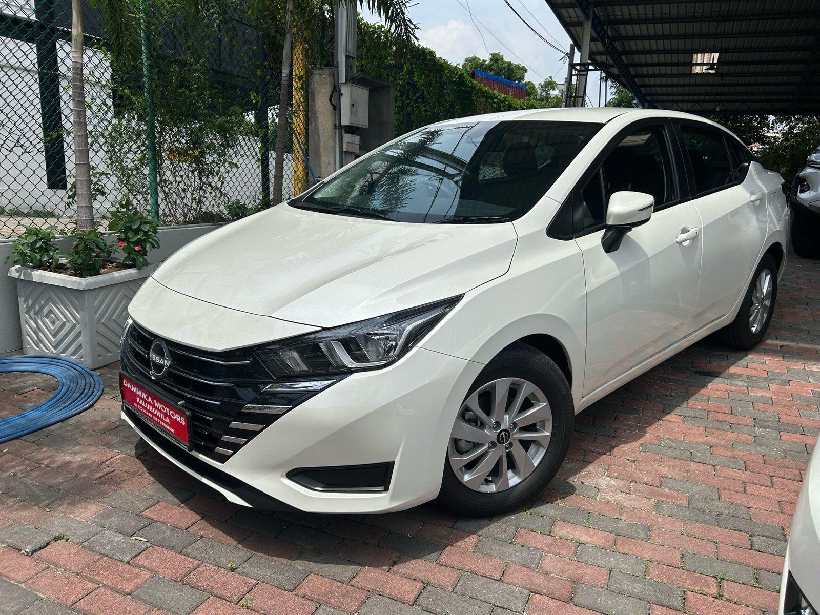 NISSAN ALMERA E – WHITE